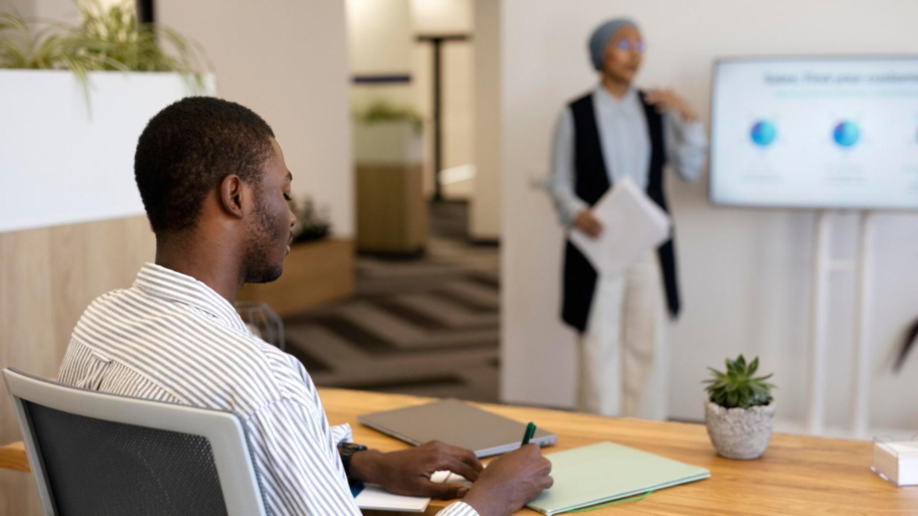 Group learning environment discussing savings strategies